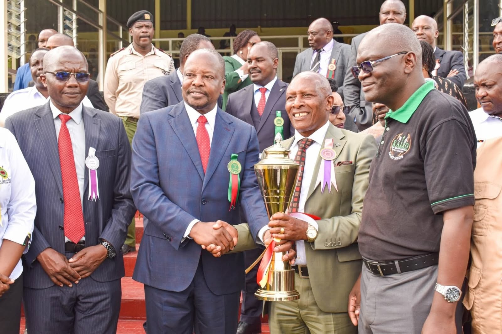 Receiving a trophy at an agricultural show